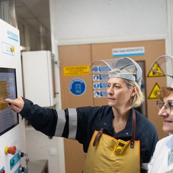 Female technicians facing a biobank control panel 1